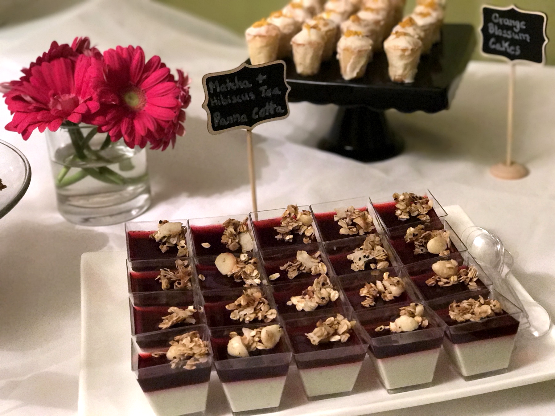 Small square desserts arranged for an event table